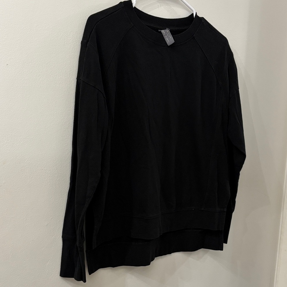 Sweaty Betty black long sleeve top - women’s size XS - side slits
